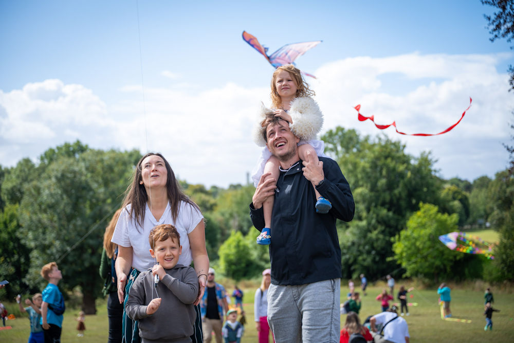 Family at Kite Festival, image Luminous Photography